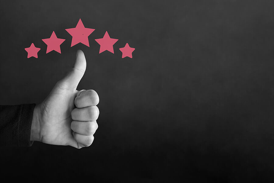 Customer Experience Concept. Thumbs up with five stars.
